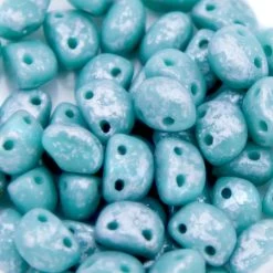 30CA185-SL: Preciosa Czech Candy Oval Two Hole Turquoise With Silver Shine 4x6mm - 50 Pieces Per Package