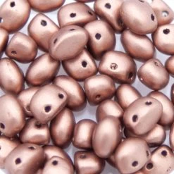30CA957-ME: Preciosa Czech Candy Oval Two Hole Silky Copper 4x6mm - 50 Pieces Per Package