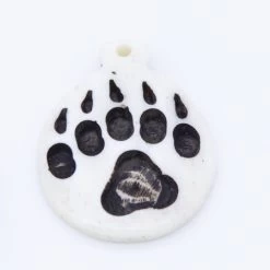 BN385-59: Bone Bear Paw Print Pendant White/Black 35x45mm - 5 Pieces